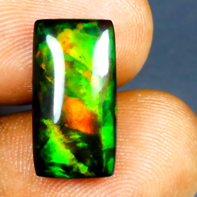 3.84 ct Phenomenal Cushion Cabochon (16 x 9 mm) Ethiopian 360 Degree Flashing Black Opal Natural Gemstone