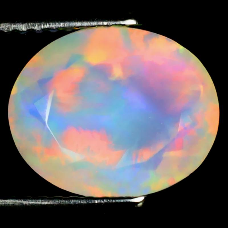 2.77 ct Remarkable Oval (12 x 9 mm) Flashing 360 Degree Multicolor Rainbow Opal Gemstone