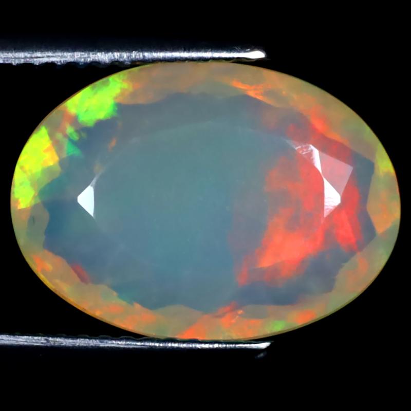 4.73 ct Flashing Oval (15 x 11 mm) Un-Heated Ethiopia Rainbow Opal Loose Gemstone