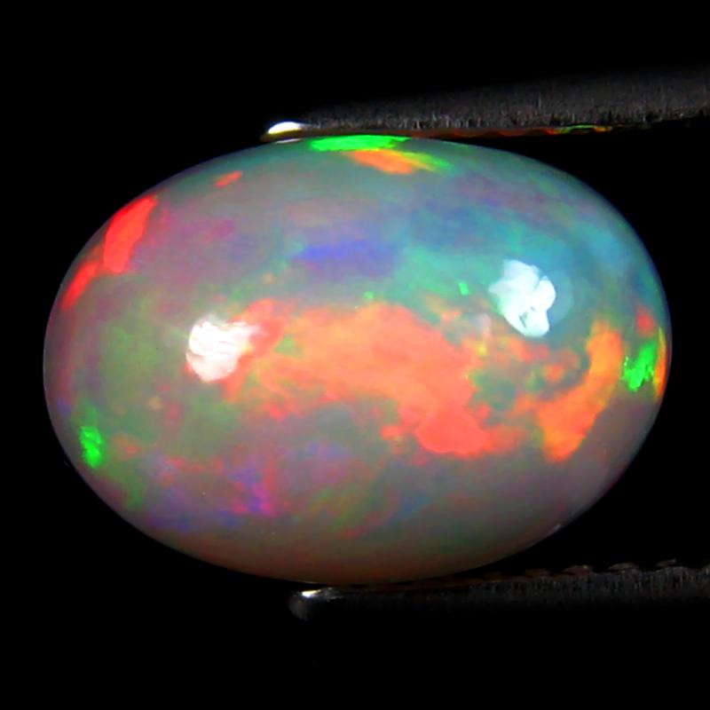 3.80 ct Significant Oval Cabochon (12 x 8 mm) Ethiopian 360 Degree Flashing Rainbow Opal Natural Gemstone