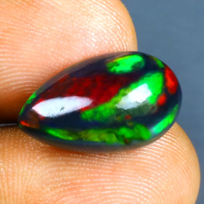 5.04 ct Phenomenal Pear Cabochon (17 x 10 mm) Ethiopian 360 Degree Flashing  Black Opal Natural Gemstone