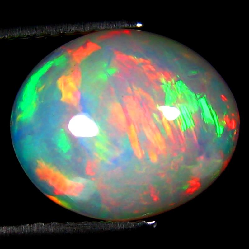 4.16 ct Tremendous Oval Cabochon (13 x 11 mm) Ethiopian 360 Degree Flashing Rainbow Opal Natural Gemstone