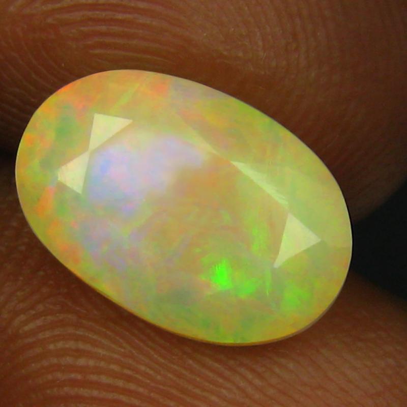 2.43 ct Eye-opening Oval (12 x 8 mm) Un-Heated Ethiopia Rainbow Opal Loose Gemstone