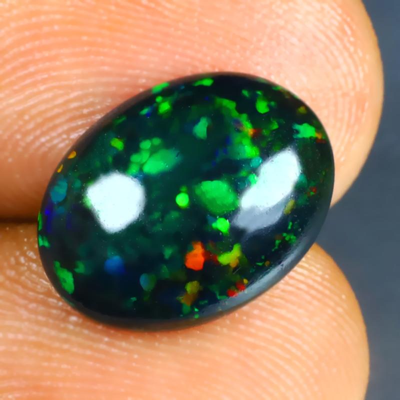 2.95 ct World class Oval Cabochon (14 x 10 mm) Ethiopian 360 Degree Flashing Black Opal Natural Gemstone