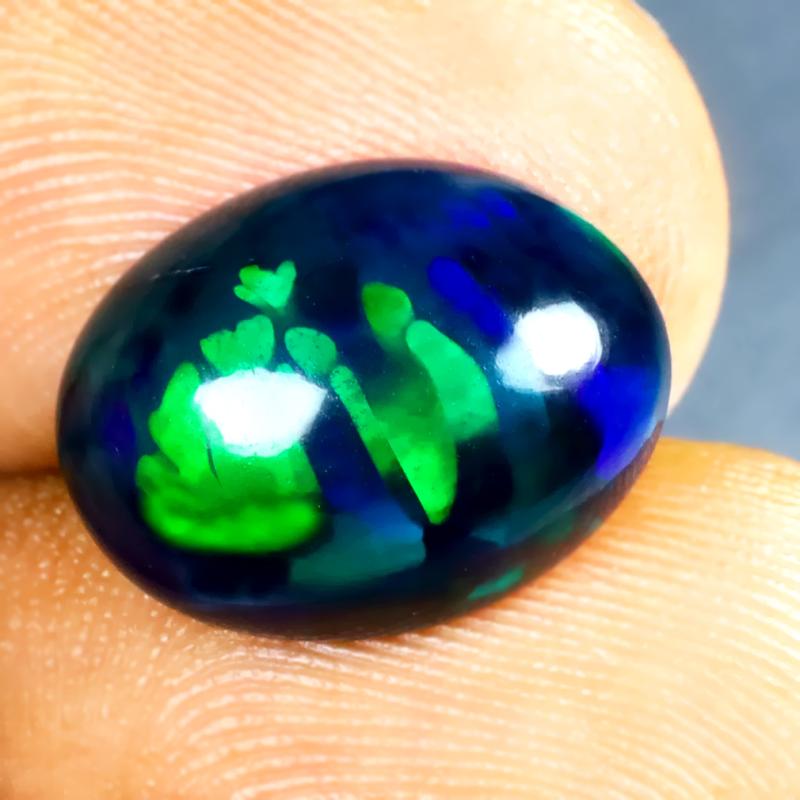 4.13 ct Topnotch Oval Cabochon (14 x 11 mm) Ethiopian 360 Degree Flashing Black Opal Natural Gemstone