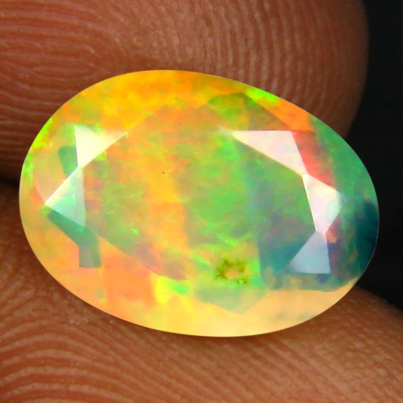 1.71 ct Very good Oval (12 x 8 mm) Un-Heated Ethiopia Rainbow Opal Loose Gemstone