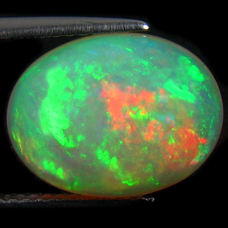 3.80 ct Awe-inspiring Oval Cabochon (14 x 11 mm) Ethiopian 360 Degree Flashing Rainbow Opal Natural Gemstone