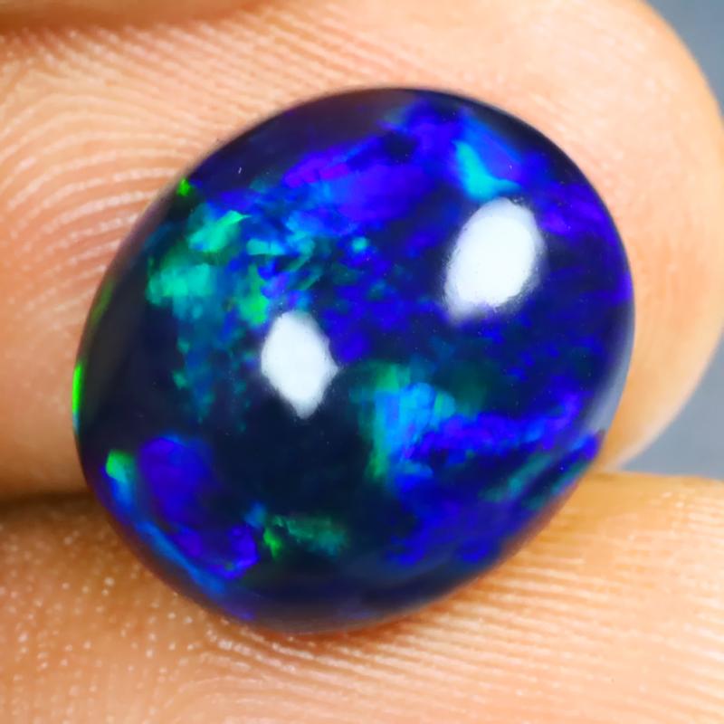 7.41 ct Romantic Oval Cabochon (14 x 12 mm) Ethiopian 360 Degree Flashing Black Opal Natural Gemstone